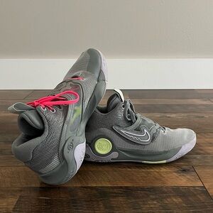 Nike Gray Athletic Shoes with Pink Laces and Yellow Details